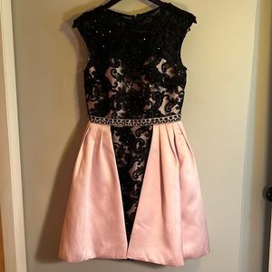 COLORS black sequin cocktail dress with pink skirt overlay & sequin belt